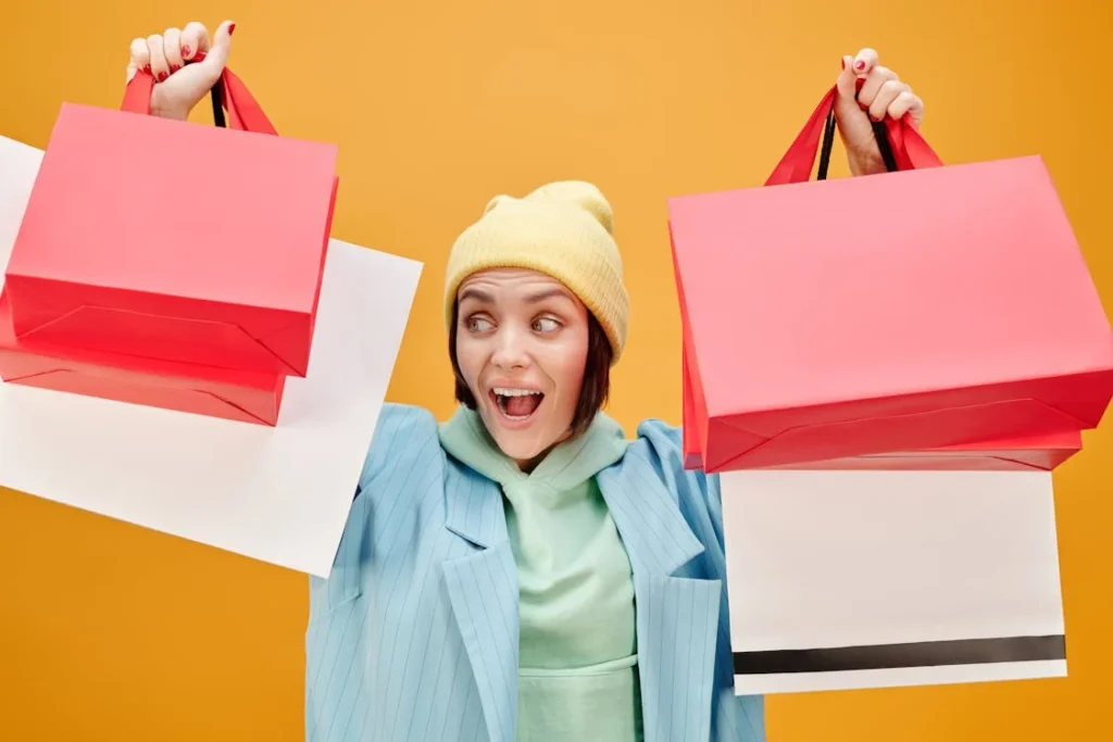 LADY CARRYING PAPER BAGS